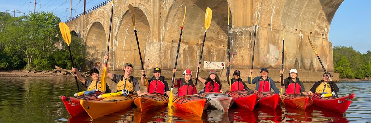 Kayakers on the Raritan River near the bridge to New Brunswick